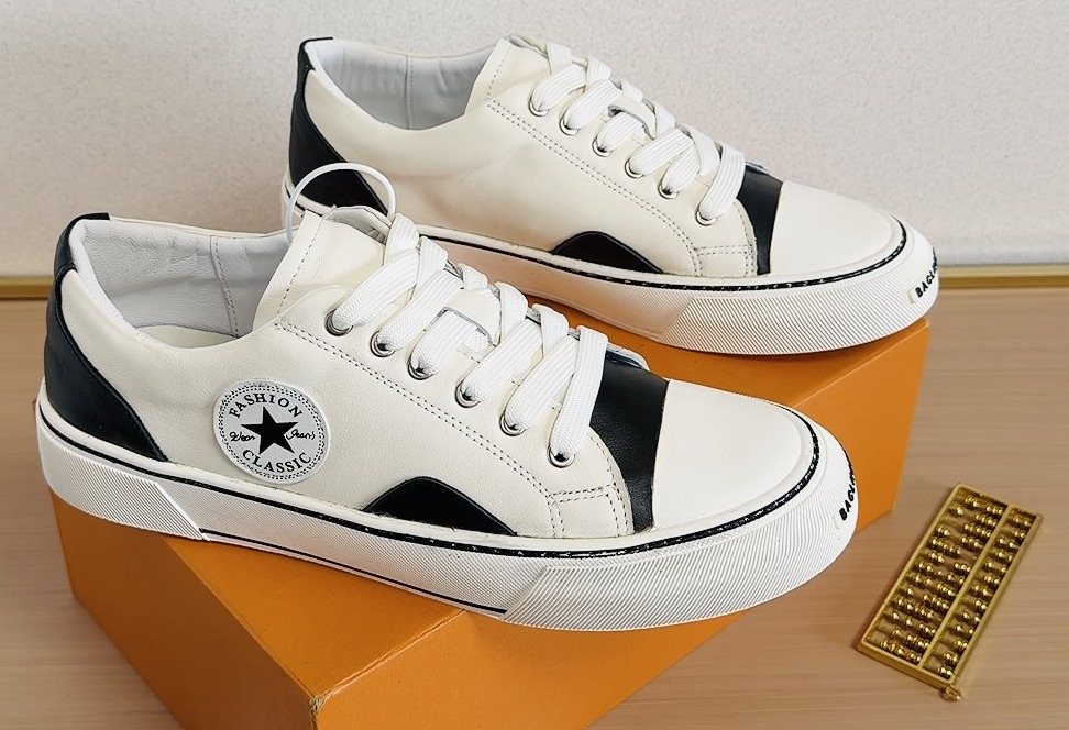 Converse White and Black Low-Top Sneakers